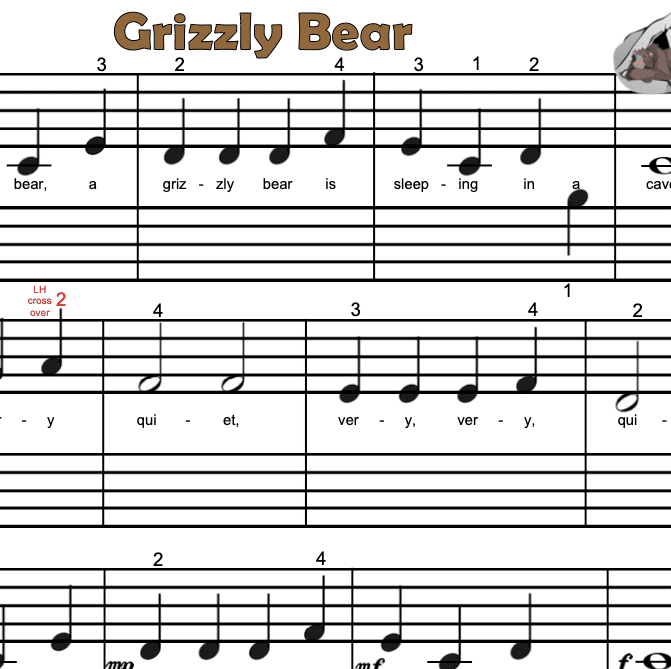 A sheet music with notes and a bear.